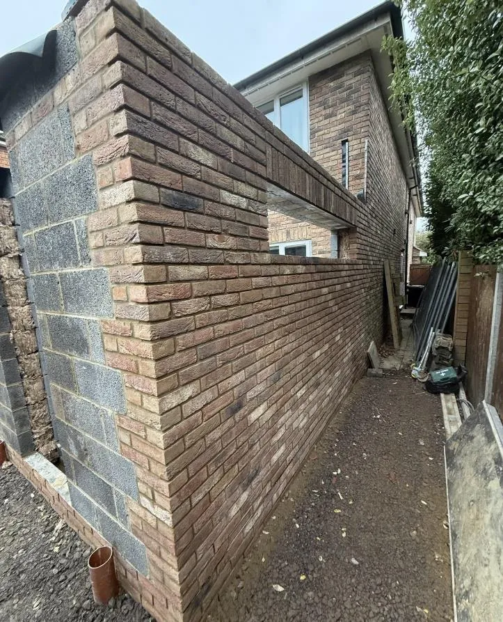 Side extension built up in blended stock brick in Rochester